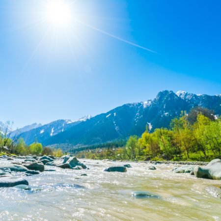 Beautiful  River and snow covered mountains landscape Kashmir state, India