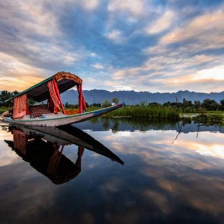 The beauty of Dal lake and the beautiful Shikaras during sunrise and sunset is the most charming thing in Kashmir